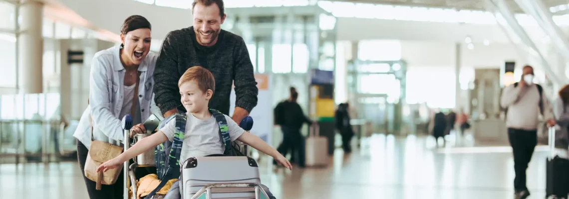 family travels in airport