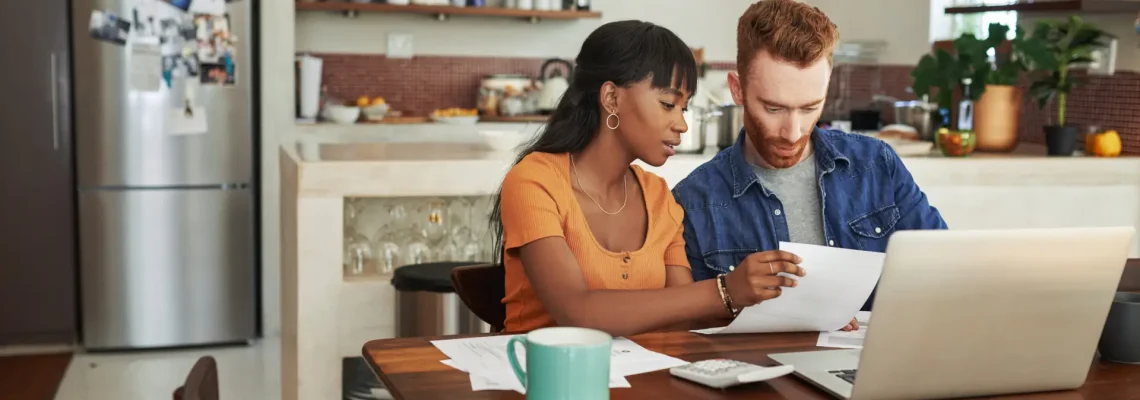 young couple reviewing their finances